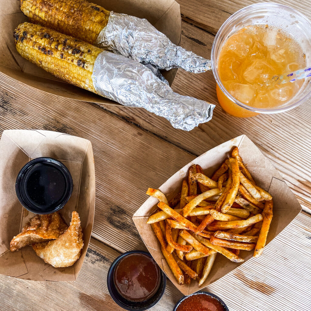 Grilled Curry Corn on the Cob, Ngumu Jungle Juice, Chicken Dumplings, and Mr. Kamal's Fries